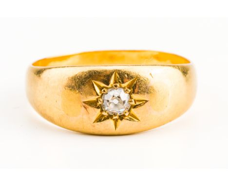 A GOLD AND DIAMOND SINGLE STONE RINGStar gypsy set with a cushion shaped diamond, unmarked, ring size Q½, gross weight 6 gram