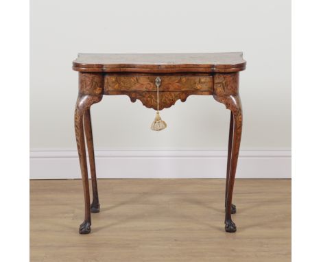 AN 18TH CENTURY DUTCH FLORAL MARQUETRY INLAID WALNUT CARD TABLEWith frieze drawer on ball and claw feet, 73cm wide; 36cm deep