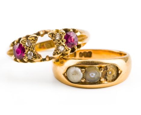 TWO GOLD RINGS (2)Comprising; an 18ct gold ring, mounted with two cushion shaped rubies and with two pairs of rose cut diamon