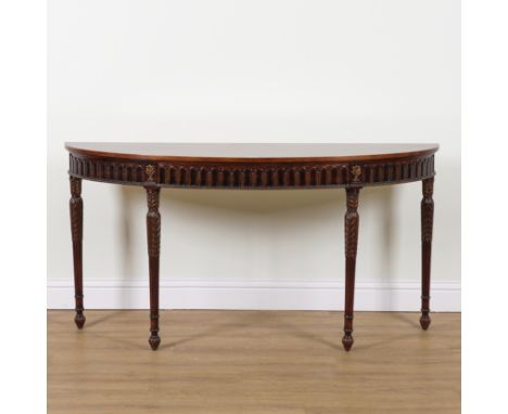 ALTHORP; A REGENCY STYLE MAHOGANY DEMI LUNE CONSOLE TABLEWith single frieze drawer over fluted acanthus supports, 173cm wide;