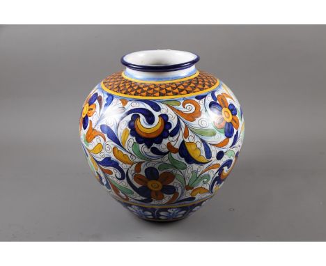 A Cantagalli bulbous vase with floral and scrolled decoration, 13" high 