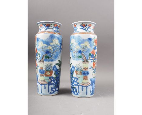 A pair of Chinese Wucal cylindrical vases with vase and flower decoration, 10 3/4" high (damages)Condition:One vase has a bro