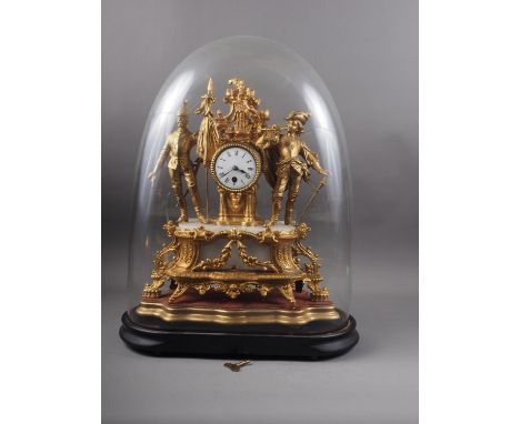 A French gilt metal and white marble mantel clock with white enamelled dial and Roman numerals, on shaped base with glass dom