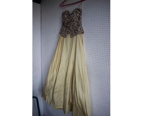 Two John Charles Eveningwear vintage ball gowns/prom dresses, one with metallic embroidered lace bodice and full-length gold 