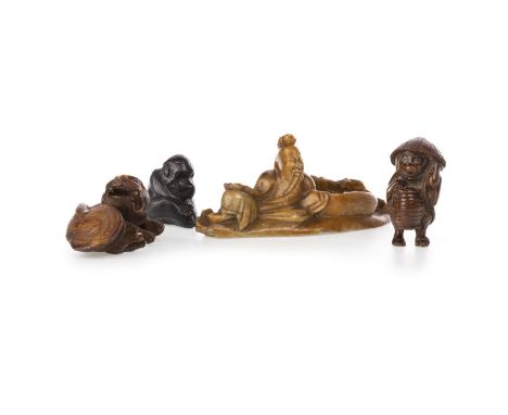 THREE EARLY 20TH CENTURY JAPANESE WOOD NETSUKE, along with a Chinese soapstone brush washer, 10cm long (4)