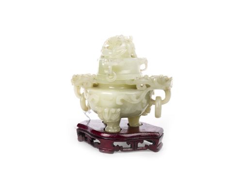 20TH CENTURY CHINESE JADE CENSER, the lid with dragon finial, the handles formed as dragon heads and rings, on three feet, on