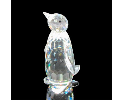 Clear crystal body with distinct facets throughout. Jet crystal eyes offset face. Swarovski backstamp. 7643085000. This item 