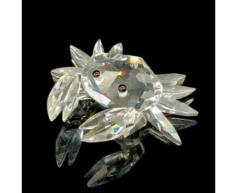 Faceted clear cut crystal, with black-colored beaded eyes. Swarovski backstamp. This item has its original box. Box measures 