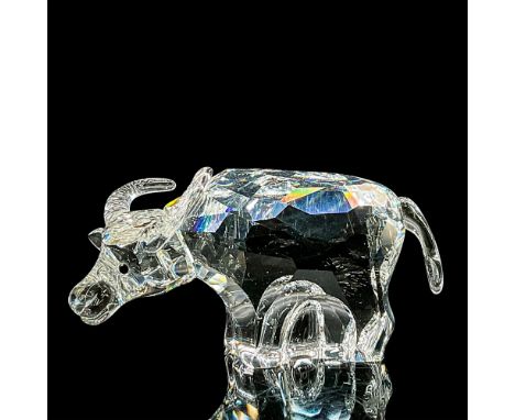 Brilliant clear crystal figure of a standing ox with black crystal eyes. Swarovski etched mark. This item has its original bo