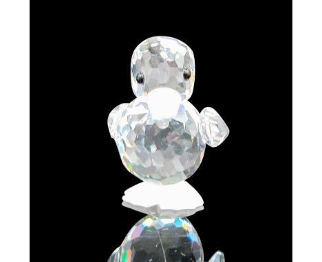 Part of the Beauties of the Lake theme group. Small standing figural has clear crystal body, black inset eyes, satin beak and