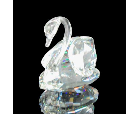 Clear, faceted body with smooth neck and face. Swarovski backstamp. 7633 050 000. This item has its original box: 4"H x 3.25"