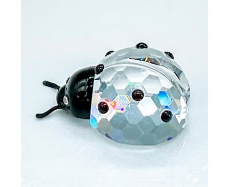 Adorable clear faceted crystal figure of a ladybug with black accents and black metal antennae. Part of the In the Secret Gar