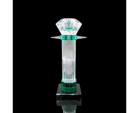 Elegant crystal design with faceted angles, which incorporates emerald crystal on a black base. Swarovski backstamp. 92800000
