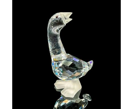 Clear faceted crystal figure of a standing goose with satin crystal beak and feet. Part of the Barn Yard Friends collection. 