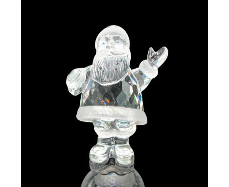 Part of the Exquisite Accents group. Clear crystal body with satin crystal accents on hat, coat and boots. Blue crystal eyes 