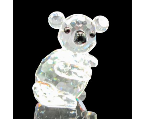 Part of the Endangered Species Collection. Clear, faceted right facing body with black eyes and nose. Swarovski backstamp. 76