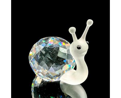 Sparkling clear and satin crystal figure of a snail with black eyes. Swarovski etched mark. This item has its original box 4"