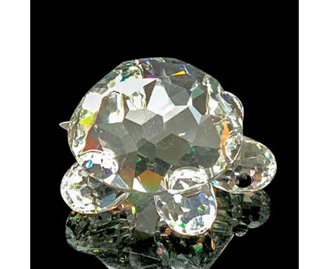 Faceted clear cut crystal, with black-colored beaded eyes. Swarovski backstamp. This item has its original box. Box measures 