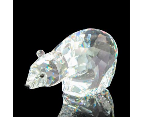 Part of the Kingdom of Ice and Snow group. Clear faceted body, round ears, black crystal eyes and nose. Swarovski backstamp. 