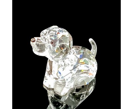 Faceted clear cut crystal, with tail and black-colored beaded eyes. Swarovski backstamp. This item has its original box. Box 