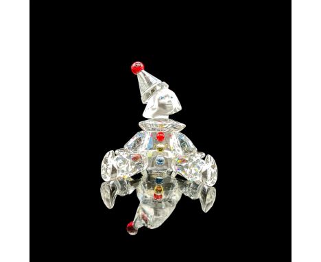 Sparkling clear crystal puppet with satin crystal head. Red, yellow and blue accents. Swarovski etched backstamp. This item h