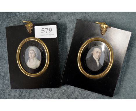 Pair of 19th Century miniature paintings on paper in ebonised frames half length portrait of a lady and a gentleman 