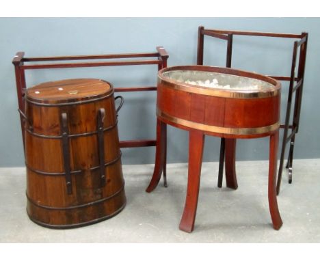 Cherry wood and brass mounted oval planter, stained pine and cast metal mounted barrel, mahogany towel rail and a mahogany cl