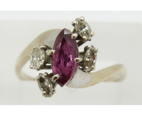 An 18ct white gold ring set with a marquise cut ruby and diamonds, in Martin &amp; Co box, 3.1g, size O