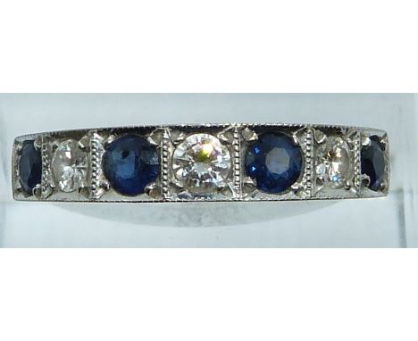 An 18ct gold half eternity ring set with sapphires and diamonds, each approximately 0.15ct, 4.9g, size P