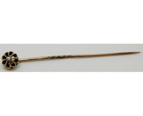 Victorian yellow metal stick pin set with a rose cut diamond