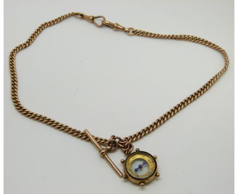 A 9ct rose gold pocket watch chain/ Albert and a 9ct rose gold compass charm, 23.5g