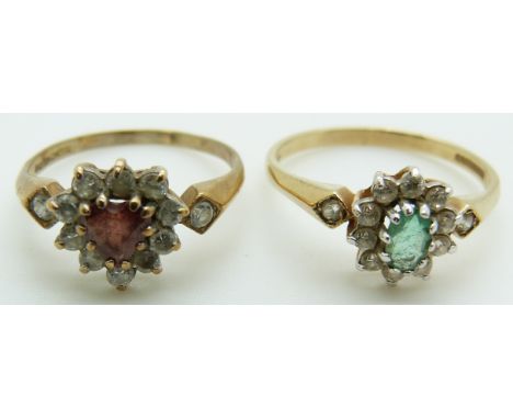 A 9ct gold ring set with a garnet surrounded by cubic zirconia and another 9ct gold ring set with an emerald surrounded by cu