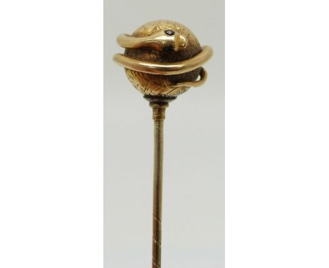 Victorian stick pin in the form of a snake wrapped around an engraved sphere