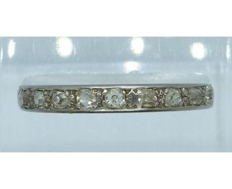 A white metal half eternity ring set with old cut diamonds, 3.6g, Q