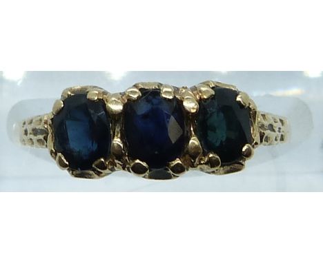 A 9ct gold ring set with three sapphires, 2.0g, size O&nbsp;