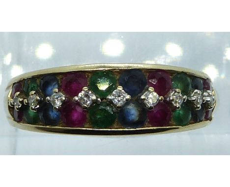 A 9ct gold ring set with round cut diamonds, emeralds, sapphires and rubies, 3.4g, size Q