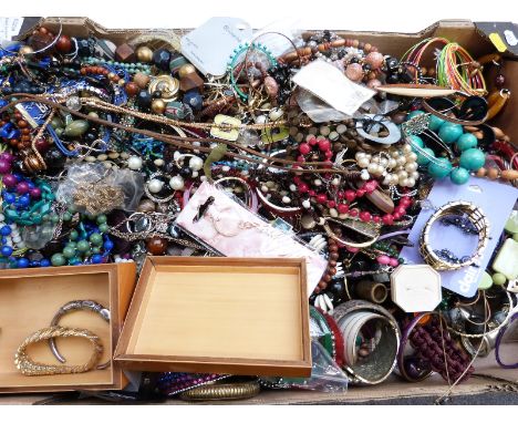 A collection of costume jewellery including white metal bangle, beads, necklaces, watches, earrings etc