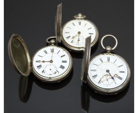 Three silver open faced pocket watches all with subsidiary seconds dials, gold hands, black Roman numerals and white enamel d