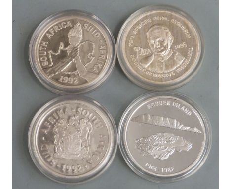 Four silver commemorative South African 2 Rand coins to include Mandela Freedom, Barcelona 1992 Olympics, Pan African Papal A