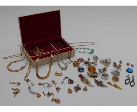 A collection of vintage brooches, Trifari necklace, rolled gold pendants etc