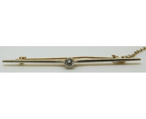 A yellow metal brooch with white metal finish set with a diamond of approximately 0.2ct, in vintage box&nbsp;