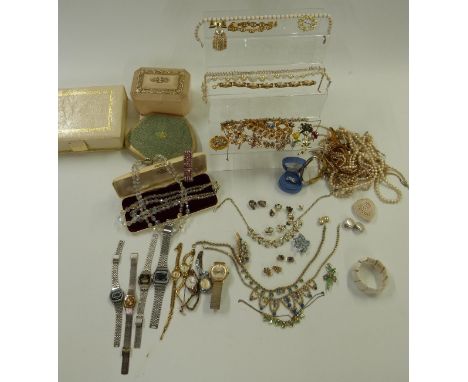 A collection of jewellery including Hollywood brooch, vintage watches, vintage necklaces, faux pearls, brooches etc&nbsp;