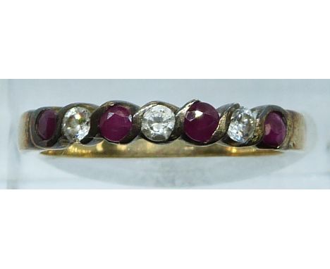 A 9ct gold ring set with rubies and alternating cubic zirconia, 1.9g, size O&nbsp;