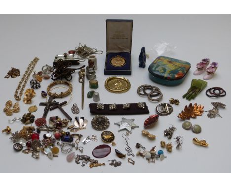 A collection of jewellery including silver brooch, silver scarf ring, silver pendants, earrings etc&nbsp;