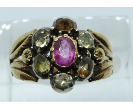 Victorian ring set with a pink sapphire surrounded by old cut white sapphires, 5.3g, size K