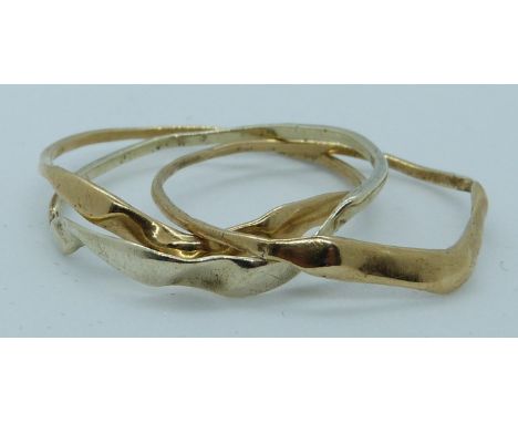 A 9ct gold puzzle ring, 2.9g, size W/X