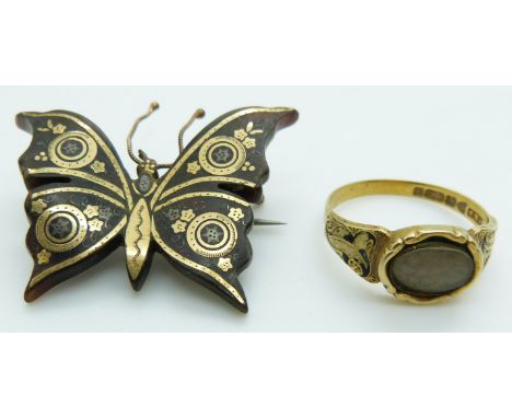 A 15ct gold mourning ring (3.4g), and a Victorian tortoiseshell inlaid brooch