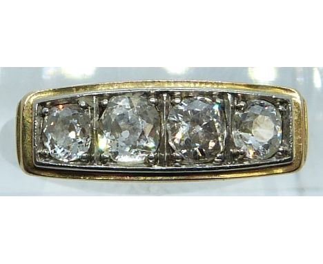 A 14ct gold ring set with four old cut diamonds of approximately 0.35ct, 0.35ct, 0.25ct &amp; 0.23ct, 4.1g, size M