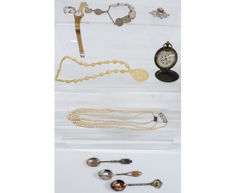 A collection of costume jewellery including faux pearls, brooch, compass, white metal bracelet, etc&nbsp;