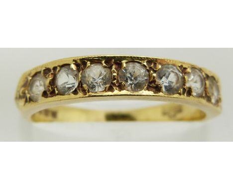 An 18ct gold half eternity ring set with cubic zirconia, 2.8g, size L